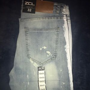 Brand New distressed jeans size 32x32